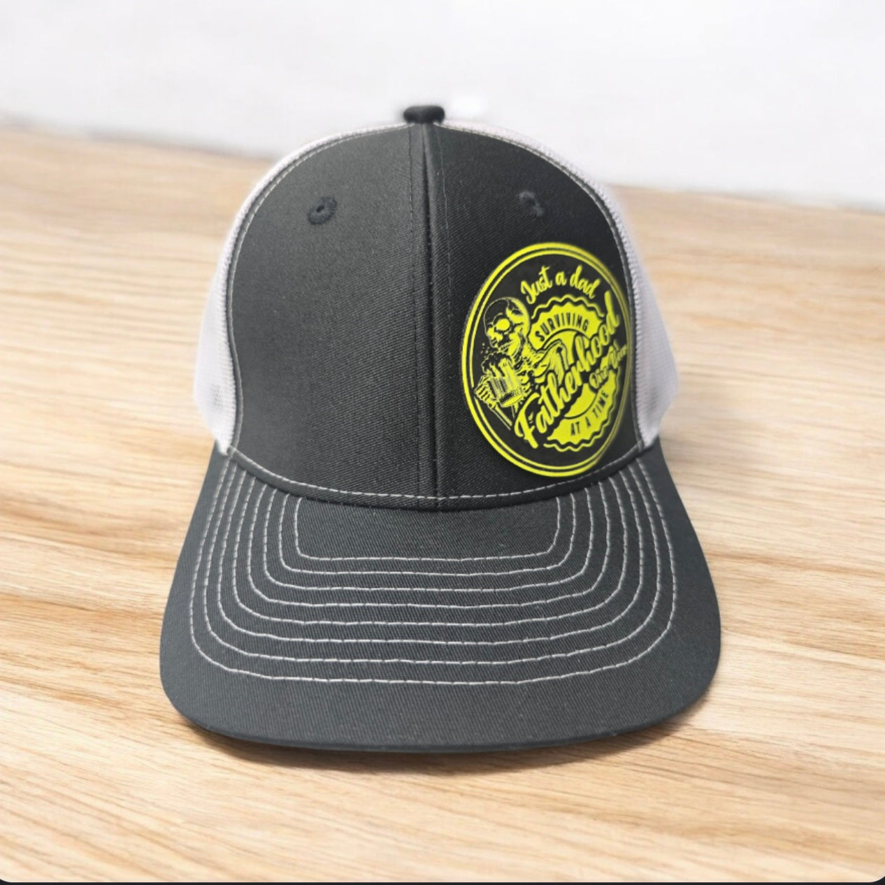 Surviving Fatherhood Funny Trucker Hat